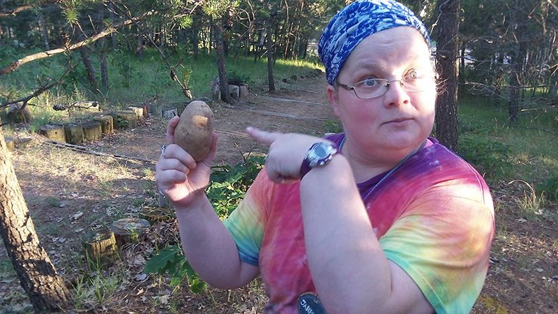 Summer Camp kid with a potato